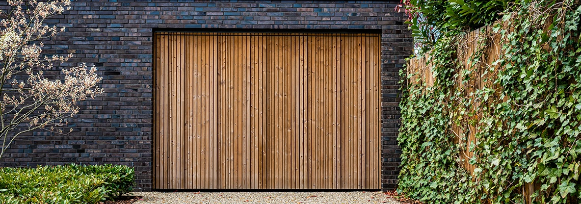 Amarr Traditional Garage Doors Tracks Repair in Coconut Creek