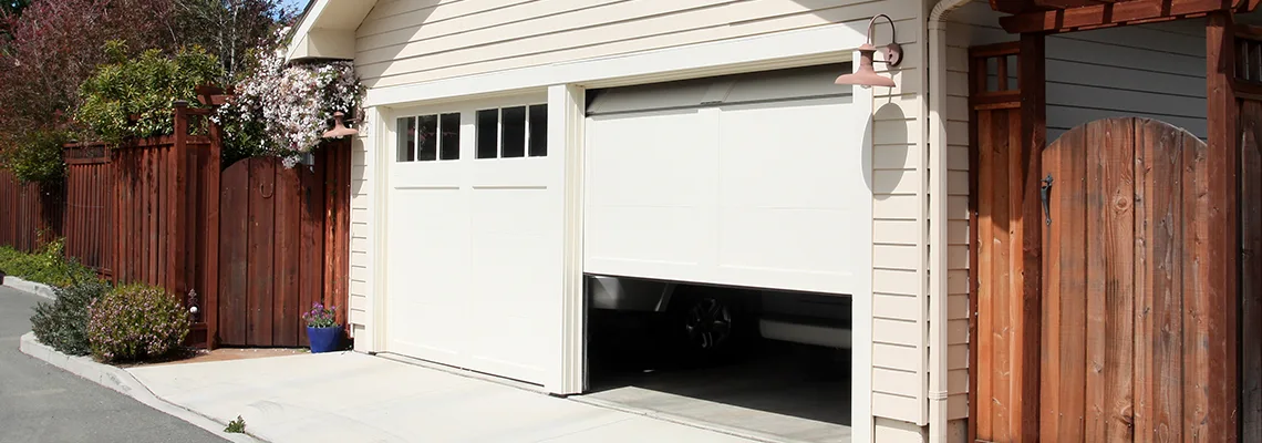 Fix Metal Garage Door Jerking in Coconut Creek